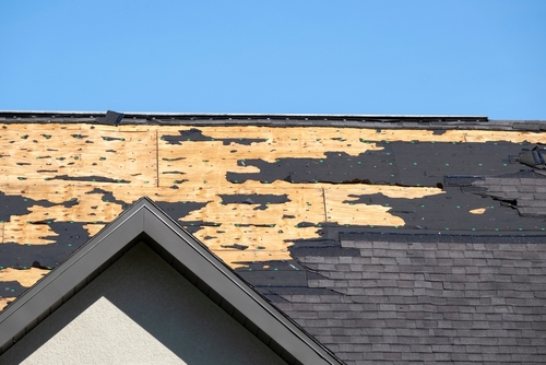 Image showing roof that suffered damage needing wind and hail damage estimators